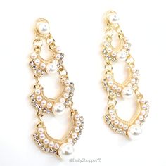 These Are Brand New Women's Faux Pearl Clear Glass Rhinestone Gold Tone Tiered Drop Statement Earrings. These Stunning Earrings Feature White Faux Pearls In Multiple Sizes With Sparkly Clear Glass Rhinestones Set On A 3 Tiered Gold Tone Drop Stud. These Earrings Are Gorgeous In Person And Perfect For A Special Occasion! All Orders Are Packaged With And Are Shipped Out Asap! Questions? Leave Us A Comment! We Are More Than Happy To Help! New To Poshmark? Use The Invite Code Dailyshopper73 When You Chic White Crystal Earrings For Party, Party Pearl Crystal Earrings, Glamorous Pearl Chandelier Earrings For Parties, Glamorous White Crystal Earrings For Evening, Glamorous White Pearl Chandelier Earrings, Glamorous Pearl Crystal Earrings For Party, White Glamorous Chandelier Earrings For Party, White Rhinestone Chandelier Drop Earrings, White Rhinestone Chandelier Earrings For Party