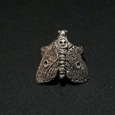 This hand-carved, solid sterling silver ring, is oxidized for a darker tone.  -This piece is a size 8, and 21g heavy- --- Please note all items are handmade and differ in a variation. Contact me if you have any questions! Moth Ring, Halloween 2024, Artifacts, Sterling Silver Ring, Pendant Necklaces, Moth, Halloween Shopping, Silver Ring, Jewelry Necklace Pendant