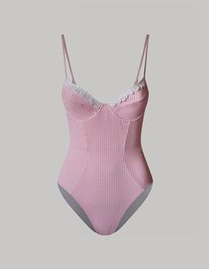 The Nikki one-piece bathing suit is crafted from a luxurious Vichy print stretch ribbed fabric in soft pink gingham highlighting this swimsuit's playful sophistication. Delicate lace detailing along the neckline adds a romantic touch, creating a subtle contrast against the vibrant pattern. The v-neckline allows for modesty yet an alluring cut providing both support and flexibility, ensuring you feel confident and comfortable. Gingham Swimwear, Feminine Fits, Pink One Piece Swimsuit, Y2k Swimsuit, Fairy Room, Pink Bathing Suits, Play Suit, Pink Lifestyle