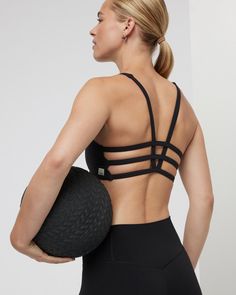 Classic medium-cut front with a strappy back, the Yosemite Sports Bra is up for adventure. Great for hiking, training and traveling. | Vuori Yosemite Bra | Black | XS Vuori makes premium performance apparel inspired by the active Coastal California lifestyle; an integration of fitness, surf, sport, and art. Breaking down the boundaries of traditional activewear, we are a new perspective on performance apparel. Strappy Back Activewear In Athleisure Style, Strappy Back Athleisure Activewear, Athleisure Activewear With Strappy Back, Athleisure Sports Bra With Multiple Straps For Yoga, Black Sporty Activewear With Adjustable Straps, Black Compressive Activewear With Tank Straps, Athleisure Sports Bra With Multiple Straps, Black Sports Bra With Adjustable Straps For Training, Athleisure Sports Bra With Multiple Straps For Gym