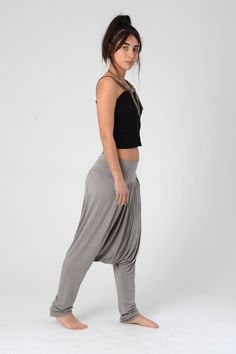 These comfortable boho Drop Crotch harem unisex pants are made of Lycra and are great to wear also while pregnant. These Harem Pants are chic, Stylish and always with a statement! It has a double Lycra band on top, which makes it easy to wear, The top part of the pant is Pleated and Not Gathered, which gives it a clean slim look! Suitable for summer and winter, all year round, Casual to Special occasions... Harem pants Women, Drop Crotch Pants, Long Unisex Comfortable Harem Pants, Grey Men's Har Bohemian Harem Bottoms With Relaxed Fit, Stretch Harem Pants For Festivals, Bohemian Full-length Relaxed Fit Yoga Pants, Bohemian Full Length Relaxed Fit Yoga Pants, Bohemian Harem Pants For Loungewear, Bohemian Ankle-length Harem Pants For Loungewear, Bohemian Relaxed Fit Long Yoga Pants, Bohemian Loose Fit Yoga Pants For Loungewear, Stretch Hippie Harem Bottoms