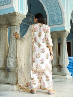 We express our love for the minimal detailing with gorgeous Mehreen sets. Matching straight kurta and pyjama, with gotta patti detailing on neck and borders. Chiffon Dupattas are also beautified with same buttis to finish the look. Color: Ivory Fabric: Kurta & Bottom-Uppada Silk Dupatta - Chiffon Note: Length and sizes can be customised Length - Kurta 40 inches Pants 38 inches Available in other colors If you happen to see some deformity in hand-work or fabric, that’s mere the technique of the s Chiffon Kurta, Silk Kurta Set, Kurta Palazzo Set, Georgette Dupatta, Printed Palazzo Pants, White Kurta, Kurta Palazzo, Palazzo Set, Silk Kurta