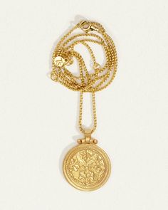 A fine gold 18k Gold Vermeil chain necklace with an eye-catching disc pendant of brushed Gold Vermeil who’s face holds the symmetrical appearance of a peacock. Feel empowered wearing this piece, as the peacock is known in ancient teachings as a symbol of royalty, immortality and power. Yellow Gold Amulet Medallion Pendant Necklace, Amulet Style Yellow Gold Medallion Necklace, Amulet Style Coin Necklace With Adjustable Chain, Round Medallion Amulet Necklace With Adjustable Chain, Round Amulet Medallion Necklace With Adjustable Chain, Yellow Gold Medallion Locket Necklace In Amulet Style, Yellow Gold Amulet Medallion Necklace, Yellow Gold Amulet Style Medallion Necklace, Timeless Necklace With Detachable Medallion Pendant