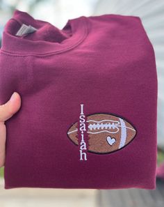 Welcome to our shop! Please make sure to leave sweatshirt color (refer to color chart in photos) and the name you would like in the personalization box. This can also be done for basketball, soccer, baseball, and tennis. Check out our website www.RusticHillsBoutique.com We offer custom orders, feel free to send us a message about what you would like us to make! If you have any questions or are interested in other fabric patterns, etc. feel free to message us also.  All of our embroidery is done on a professional grade machine using high quality materials and tools.  Please double check spelling when leaving the monogram in the personalization box.  We do not offer exchanges. We only offer a refund if we made a mistake. We are not responsible for lost packages nor stolen packages after ship Varsity Sweatshirt With Embroidered Logo For Sports Events, Varsity Sports Sweatshirt With Letter Embroidery, Team-colored Sweatshirt With Embroidered Logo For Sports Events, Collegiate Sweatshirt With Embroidered Graphics For Sports Season, Sporty Crew Neck Sweatshirt With Custom Embroidery, Team Spirit Sweatshirt With Letter Embroidery For Game Day, Team Spirit Sweatshirt With Custom Embroidery For Game Day, Team Spirit Sweatshirt With Letter Embroidery For Sports Season, Team-colored Sweatshirt With Embroidered Logo For Game Day