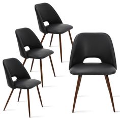 four black chairs with wooden legs and one is upholstered to the side, all in