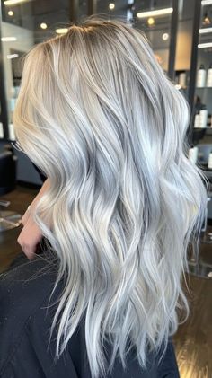 39 Silver Hair Ideas to Channel Your Inner Silver Siren - Luxe Luminous Ice Grey Hair, Icy Ash Blonde Hair Balayage, Platinum Hair With Lowlights, Ash White Hair, Silver Hair Ideas, Greyish Blonde Hair, Platinum Silver Hair, Sand Blonde Hair, Icy Blonde Hair Color