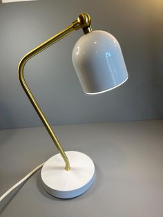 The Vintage Dylan Bullet-Shaped LED Table Lamp from Project 62 is a sleek and functional addition to any office, study area, or desk. Its bullet-shaped design offers a modern, minimalist aesthetic, while the LED shade, equipped with an adjustable pivot joint, allows for easy positioning to direct light precisely where needed. Ideal for tasks like reading, studying, or detailed work, this lamp provides bright, focused illumination that reduces eye strain. Its stylish form not only enhances functionality but also adds a decorative element, making it both a practical and visually appealing piece for any workspace. Modern Minimalist Aesthetic, Study Area, Project 62, Study Areas, Led Table, Led Table Lamp, Eye Strain, Desk Lamps, Minimalist Aesthetic