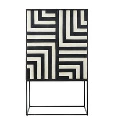 a black and white cabinet sitting on top of a metal stand