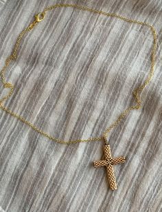 Beaded cross necklaces made with Japanese delica beads and hung from chains. Beaded Cross Necklace, Cross Necklaces, Beaded Cross, Delica Beads, Beaded Necklaces, Chain Styles, Delicate Bracelet, Cross Necklace, Beaded Necklace