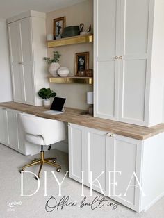 a white desk with a laptop on top of it next to some shelves and cupboards