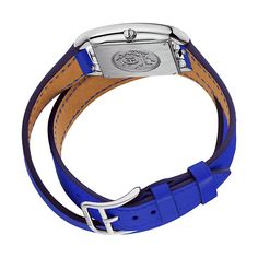 Hermes steel watch, 23 x 23 mm, opaline silvered dial, quartz movement, long interchangeable double tour strap in smooth electric blue calfskin Wrist size: 150-165 mm Size: small modelCase: steel, 23 x 23 mmAnti-glare sapphire crystalWater-resistant to 3 bar. Avoid all contact with water while wearing your Hermes leather watch.Dial: opaline silveredMovement: quartz, made in SwitzerlandFunctions: hour, minuteBracelet: smooth electric blue calfskin, interchangeable, wrap-around, long, steel pin bu Timeless Blue Rectangular Watch, Blue Rectangular Timeless Watch, Silver Leather Watch Band With Rectangular Dial, Classic Blue Rectangular Watch Accessories, Blue Rectangular Business Watches, Luxury Adjustable White Gold Watches, Luxury Blue Bracelet Strap Watch Bands, Luxury Blue Watch With Bracelet Strap, Luxury Blue Watch Bands With Bracelet Strap