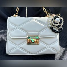 This Bag Is Gorgeous. It Comes With An Unbranded Flower Purse Charm. Nwt Bundle And Save Reasonable Offers Considered Luxury White Square Bag, Luxury White Square Bags, Designer White Square Bag, Designer White Evening Bag For Daily Use, Designer White Square Bags, Elegant White Flap Bag With Detachable Strap, Luxury White Square Evening Bag, Luxury Pouch Bag With Pearl Handle, Designer White Rectangular Evening Bag