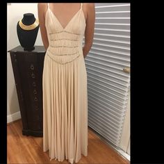 Beautiful, Elegant Ivory Gown. Perfect For Any Occasion! A Real Head Turner!It’s A Beautiful Ivory Color With A Blush Pink Undertone. Worn Once For A Wedding. True To Size. Stretchy Fabric And Flowy Skirt. Modest Sweetheart Neckline With A Low Back. Has A Hidden Zipper, It’s Fully Functional. It’s A Full Length Gown. Has Loose Threading On The Back Can Be Easily Fixed At The Dry Cleaners. Great Quality Fabric Cream Floor-length Evening Dress For Prom, Elegant Cream Dress For Prom Season, Cream Floor-length Prom Dress, Cream Gown For Prom, Elegant Cream Prom Dress, Cream Maxi Dress For Prom, Cream Party Gown With Fitted Bodice, Cream Gown With Fitted Bodice For Party, Fitted Cream Evening Dress For Prom Season