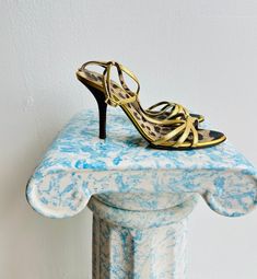 Roberto Cavalli main label gold leather delicate strappy sandals with a wooden heel.  The insole is done with leopard print leather.  Worn lightly, in good looking condition. Heel height 4" Gold Strappy Sandals, Main Label, Sandal Heels, Strappy Sandals Heels, Wooden Heel, Gold Leather, Roberto Cavalli, Printed Leather, Strappy Sandals