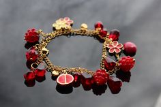 High quality non tarnish handmade jewelry  Legend has it that raspberries are originally a white fruit. The nymph Ida, daughter of the King of Crete and nurse of Zeus, wanted to pick a raspberry to calm his sorrow. She pricked her breast with the raspberry thorns and the fruit then turned a blood-red color. The pomegranate was revered for the beauty of its shrub, flowers, and fruit--symbolizing sanctity, fertility, and abundance. The Song of Solomon compares the cheeks of a bride behind her veil Raspberry Jewelry, White Fruit, Blood Red Color, Pomegranate Jewelry, Daughter Of The King, Fruit Jewelry, Indie Jewelry, Shiny Objects, Hippie Vibes