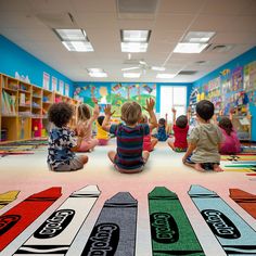 children sitting on the floor in a classroom