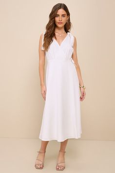 Your trend-setting wardrobe just wouldn't be complete without an essential look like the Lulus Charming Tendencies White Surplice Wrap Midi Dress! Lightweight linen-blend woven fabric shapes this sweet dress that features a sleeveless bodice with a flirty surplice neckline, a V-cut back, and long straps that tie at the shoulders. The flattering wrap silhouette features slender ties that secure at the side, before falling to a chic midi hem. Fit: This garment fits true to size. Length: Mid-calf l Elegant A-line Sundress With Tie Back, Chic A-line Sundress For Daywear, Elegant V-neck Sundress For Brunch, Elegant Solid A-line Sundress, Elegant V-neck Sundress For Day Out, Feminine V-neck Sleeveless Dress For Brunch, Knee-length Maxi Dress With Tie Back For Brunch, Knee-length Maxi Dress For Brunch With Tie Back, Spring V-neck Dress With Tie Waist