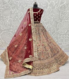 Great art of work in Bollywood Bridal Lehengacholi  Code : A2304 Lehenga : Fabric - velvet  Work - fancy work              Sequins               Dori and Thread work Stitching - standard cancan and canvas attached  Size - free size up to 42 Flair - 3.5 meter plus  Blouse : Fabric - velvet  Work - same as lehenga  Size - 1.2 meter long  Backside - yes work is there  Dupatta : Fabric - softnet  Work - same as lehenga  Size - 2.5 meter long  Weight - 6kg approx Semi-stitched Embroidered Choli For Traditional Ceremonies, Embroidered Semi-stitched Choli For Traditional Ceremonies, Bollywood Style Embroidered Choli For Traditional Ceremonies, Embroidered Banarasi Silk Choli For Navratri, Embroidered Lehenga For Traditional Ceremonies At Diwali, Embroidered Dola Silk Choli For Traditional Ceremonies, Embroidered Semi-stitched Choli With Traditional Drape, Diwali Embroidered Lehenga For Traditional Ceremonies, Embroidered Lehenga For Diwali And Traditional Ceremonies