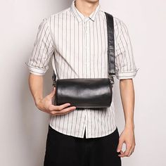 Handbags Type: Shoulder Bags Types of bags: Shoulder & Crossbody Bags Main Material: Genuine leather Lining Material: COTTON Shape: Barrel-shaped Hardness: SOFT Pattern Type: Solid Closure Type: zipper Gender: MEN Style: Casual Number of Handles/Straps: Single Black Rectangular Duffle Bag With Detachable Strap, Classic Portable Satchel Shoulder Bag, Black Satchel For On-the-go, Classic Portable Shoulder Satchel, Business Black Phone Bag, Black Satchel Chest Bag With Detachable Strap, Black Portable Bags For Business, Black Leather Camera Bag Pouch, Portable Black Bags For Business