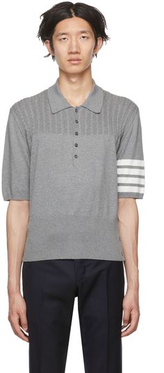 Knit cotton polo. · Rib knit spread collar, cuffs, and hem · Five-button placket · Cable knit panel at front and back · Stripes at sleeve · Buttoned vent and concealed tricolor grosgrain trim at side-seams · Tricolor grosgrain flag at back Supplier color: Light gray Cotton Polo, Thom Browne, Knit Cotton, Online Shopping Clothes, Button Placket, Tri Color, Color Light, Light Gray, Cable Knit