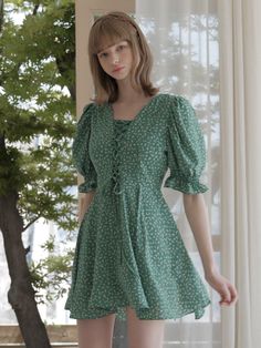 Editor's NotesDaisy Puff Dress GREEN from AVANDRESS is a dress product made of fabric with a daisy pattern. It has a string detail on the front. The back of the dress has a zip closure.- Puff sleeves- String details- Zipper detail- High quality stitchesMeasurements (in.)- S / M- Length: 31.8 / 32.2 in.- Shoulder: 12.9 / 13.3 in.- Chest: 16.9 / 17.9 in.- Sleeve: 12.5 / 12.9 in.*Model InformationModel 1- Height: 5'6 Top: S Bottom: MModel 2- Height: 5'6 Top: S Bottom: MComposition & Care- 100% Green Puff Sleeve Mini Dress For Summer, Green Floral Mini Dress With Ruffles, Casual Green Puff Sleeve Dress With Square Neck, Green A-line Ruched Dress, Fitted Green Puff Sleeve Dress With Floral Print, Green Ruched Puff Sleeve Summer Dress, Summer Green Ruched Puff Sleeve Dress, Green Ruched Puff Sleeve Dress For Summer, Green Square Neck Puff Sleeve Dress For Spring