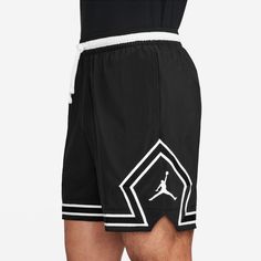 Unmistakably iconic, the Jordan Woven Diamond shorts have reclaimed the spotlight. Constructed from a relentless four-way stretch-woven fabric and amped with moisture-wicking magic, this pair ensures you stay cool, dry, and stylish. No matter if you're dominating the court or strutting your stuff off-court, from sinking free throws to tackling the checkout line, these shorts guarantee an air of freshness that's locked in—a statement not to be ignored. Stretch-woven fabric feels lightweight, dura Diamond Shorts, Jordan Shorts, White Kicks, Wide Width Shoes, Nike Tees, Basketball Shorts, Short Jacket, The Court, Stay Cool