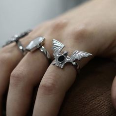 This eye-catching vampire bat ring completes any bat lover's outfit! This ring design depicts a vampire bat with its wings spread wide and ready to take flight. A great everyday accessory or gift for loved ones and yourself. Ring Sizing Chart Material: Zinc Alloy Click ADD TO CART To Order Yours Now! The Checkout Process is Guaranteed to be 100% Safe and Secure with Visa, Mastercard, AMEX, Discover, Apple Pay or PayPal. Ring Horror, Gothic Jewelry Rings, Vampire Ring, Witch Ring, Sugar Skull Ring, Bat Ring, Bat Jewelry, Witch Rings, Halloween Ring