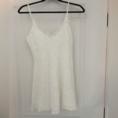 Urban Outfitters White Lace Dress Size Extra Small. New With Tags. Small Dot That Would Come Out In Wash On Right Edge. Urban Outfitters White Dress, White V-neck Mini Dress By Urban Outfitters, Urban Outfitters Cotton Mini Dress For Daytime, White Urban Outfitters Mini Dress For Daytime, White Mini Dress By Urban Outfitters For Daywear, Urban Outfitters Spring Mini Dress With Lace Trim, Urban Outfitters Sleeveless Dress With Lace Trim, Sleeveless Lace Trim Dress From Urban Outfitters, Fitted Mini Dress By Urban Outfitters For Daytime