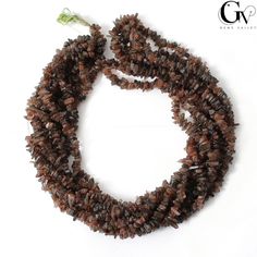 two strands of brown glass beads on a white background