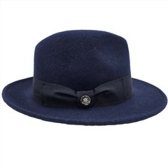 Step back in time with our Women's 1930's Wool Felt Hat, a timeless accessory that channels the elegance and grace of a bygone era. Crafted with meticulous attention to detail, this hat is inspired by the iconic fashion of the 1930s, offering a perfect blend of vintage charm and modern sophistication. Made from high-quality wool felt, this hat boasts a classic silhouette that captures the essence of 1930s style. With its medium brim and tailored design, it exudes understated elegance and complem Vintage Solid Color Felt Hat With Flat Brim, Vintage Solid Flat Brim Felt Hat, Retro Formal Fedora With Wide Brim, Classic Winter Cloche Hat, Vintage Adjustable Fedora In Solid Color, Retro Adjustable Fedora For Formal Occasions, Elegant Wool Fedora For Winter, Classic Adjustable Brimmed Cloche Hat, Elegant Solid Fedora With Curved Brim