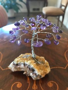 I handmade this Gemstone Tree of Life with genuine amethyst stones for the leaves & silver wire for the trunk & branches & a genuine natural sparkling Citrine Druzy Rock for the base. Amethyst brings such peaceful & calming loving vibes and Citrine brings much abundance. 💜 Height of whole thing is about 4 inches **you get the exact piece shown in the photos. It is a one of a kind. 😊 I tried to take pics in different lighting. These stones have such great healing properties....I hope it will br Handmade Spiritual Tumbled Crystals, Lavender Amethyst Crystals As A Gift, Lavender Amethyst Crystals For Gift, Purple Mineral Crystal For Jewelry Making, Spiritual Amethyst Crystals, Handmade Lavender Crystals For Spiritual Use, Handmade Lavender Spiritual Crystals, Handmade Lavender Amethyst Crystals, Handmade Silver Amethyst Crystals