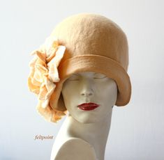 Cloche  hat Beige felt hats Cloche Felted Hats felt hat Cloche Hat Flapper Hat Art  Hat La belle epoque Art Deco 1920s hat Art Hats  hat cloche  1920's hat Gatsby's hat Great, very flattering beige  hat with roses in shades of   beige, camel, ivory color !  Adapts to the head ! Special and unique ! Sophisticated and elegant !  As the base for my works I use great materials like highest quality Australian merino wool (18 micro). All my works are made by hand in the process of long-term, hand felt Cappello Cloche, 1920s Hat, Felted Hats, 1920 Art, Gatsby Hat, La Belle Epoque, Cloche Hats, Hat Felt, Hat Art