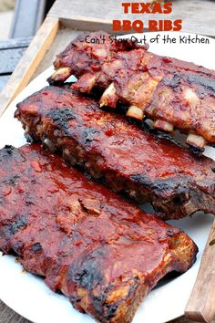 bbq ribs on a plate with barbecue sauce in the middle and text overlay that reads texas bbq ribs