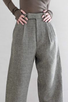 Made with 100% wool, these wide leg pants are a must-have for winter. They drape beautifully. and is soft to the touch. These wool pants features a zipper and button closure. Style #: WWAH909 Trousers For Winter, Fall Wide Leg Pants With Welt Pockets, Spring Wool Straight Pants, Chic Wool Straight Leg Bottoms, Tailored Wool Pants For Spring, Winter High-waisted Pants With Welt Pockets, Spring Wool Bottoms With Welt Pockets, High-waisted Pants With Welt Pockets For Winter, High-waisted Wide Leg Pants With Welt Pockets For Fall