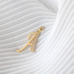 "14K Gold Initial Necklace With CZ, 14K Yellow Gold Initial Pendant with White CZ Stone, Dainty Initial Necklace, Initial Necklace with CZ, an initial necklace is great to wear for everyday or special occasions. Can be worn with other necklaces, great for layers. A Perfect 14K Gold gift. . . . ALL LETTERS FROM A-Z ARE AVAILABLE . . . * Pendant approximate measurement including the bail: (20x10 mm) * Chain: Sold Separately * Stamp: Real 14k Gold * Never gold filled or plated * Packaged With Free Cz Initial Necklace, Gold Diamond Jewelry With Initials, Personalized Dazzling Gold Jewelry, Gold Initials Necklace In Cubic Zirconia, Gold Cubic Zirconia Necklace With Initials, 14k Gold Initial Necklace, J Necklace, Gold Initial Pendant, Gold Jewels Design