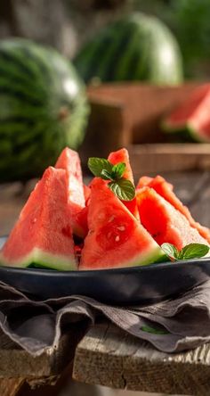 slices of watermelon are on a plate