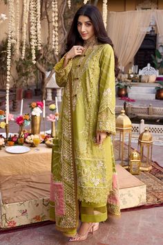 Green Embellished Kameez Trousers Pakistani Eid Dress is an elegant attire adorned with embroidery and threads. Lavish floral designs and hand-worked details make this beautiful Pakistani Dress an epitome of beauty and your foremost priority for the big day. Detailed Description: SKU: PB0078 Detailing: Embroidery, Threads, Floral designs Color: Parrot Green Fabric: Lawn Design: Fully Embroidered dress Event: Festive, Party wear Parrot Color Suit, Bridal Foot Jewelry, Green Cotton Dress, Eid Dress, Dress Event, Lawn Design, Parrot Green, Lawn Dress, Beautiful Pakistani Dresses