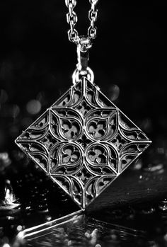 {Rhombus} Gothic silver pendant Do you love medieval architecture and unique style? If so, then our gothic pendant collection is perfect for you! Each piece in this collection is made to be a one-of-a-kind treasure. We have jewelry for people who love to explore the great outdoors, as well as those who love to stay in. With memories and kindness. ∙ M A I N ∙ I N F O R M A T I O N ∙ Material: Sterling silver Sizes: 25x25mm Weight approx: 7 gr. Finish: Polished Oxidised (Blackened) ∙ O T H E R ∙ I Gothic Architecture Jewelry, Traditional Medallion Jewelry With Historical Design, Ceremonial Medallion Jewelry With Historical Design, Traditional Pendant Necklace With Historical Design, Ceremonial Historical Pendant Jewelry, Ceremonial Historical Design Pendant Jewelry, Gothic Pendant Jewelry For Festivals, Elegant Festival Jewelry With Large Pendant, Medieval Style Engraved Pendant Jewelry