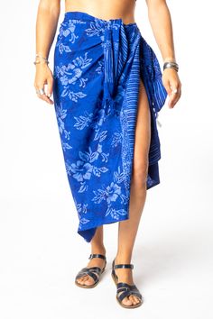 Set your watch to island time and embrace the artistic origins of our tasseled sarong wraps. Dyed with the traditional Indonesian batik method, the colors on this batik sarong are bright and vibrant, and the patterns are uniquely boho chic! From its traditional South Pacific use as a woman's or man's wrap skirt to a hippie skirt, a wall hanging, turban, tablecloth or window dressing, you will never run out of options with a beautiful batik sarong! All Mexicali Blues batik items are handmade in B Hippy Skirt, Magic Skirt, Batik Sarong, Sagittarius Gifts, Green Gardens, Aries Gifts, Hippie Skirt, Womens Dress Tops, Blue Hibiscus