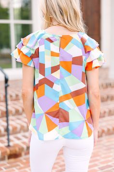 This abstract blouse is absolutely perfect for summer work days! Those colors are so much fun and we love that classic fit! This blouse is going to be such an easy go to for any day of the week. This blouse features short ruffled sleeves, a round neckline, and a colorful abstract print. Material has no amount of stretch.Baileigh is wearing the small. Easy Go, Ruffled Blouse, Summer Work, Mint Julep Boutique, Mint Julep, Day Of The Week, Ruffled Sleeves, Easy Going, Colorful Abstract