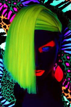 a woman with neon green hair and blue eyes is seen in this instagramtion