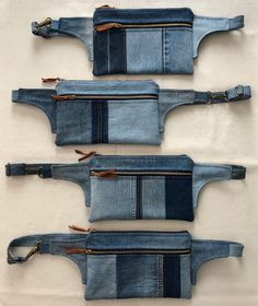 four pieces of denim with zippers are shown in three different positions, one is empty