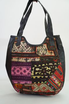 This gorgeous Indian Jaipuri Morral is perfect to style with any outfit! It is completely hand-embroidered and made on a waist loom, These beautiful bags are handmade by Indian artisans in Jaipur, Rajasthan. Material - 100% Cotton Fabric, The bag closes with a High-Quality zipper. Our bags are strictly produced by our skilled team with the natural traditional way of craftsmanship. A Perfect Shoulder Bag / Hobo Bag / Tote Bag / Hand Bag to give to an elegant look. This is the perfect gift for all Traditional Handmade Multicolor Hobo Bag, Multicolor Weaving Work Bag For Everyday, Everyday Multicolor Shoulder Bag With Weaving Work, Multicolor Artisan Hobo Tote Bag, Artisan Multicolor Hobo Tote Bag, Handmade Multicolor Embroidered Hobo Bag For Everyday Use, Bohemian Multicolor Embroidered Handwork Bags, Bohemian Shoulder Bag With Woven Motifs, Traditional Handmade Hobo Tote Bag