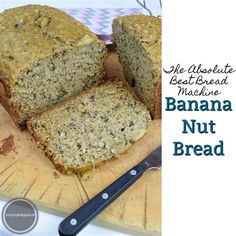 banana nut bread on a cutting board with a knife