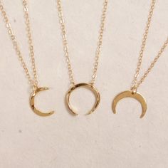 Moon necklaces on 14k gold filled dainty chain - Short layering necklaces - Moon and celestial - Whimsical gift ideas for Her - Moon Phase Choose from the drop down menu the shape you want. Each necklace sold individually. Crescent Moon (Left of product photo): 16mm x 17mm Thin horn Moon (Center of photo): 15mm x 15mm Crescent horn Moon (Right of Photo): 16mm x 10mm Material Pendant: 14k gold over sterling silver Chain: 14 gold filled chain Made in the USA Whimsical Gift Ideas, Necklaces Moon, Chrysoprase Necklace, Moon Necklaces, Moon Necklace Silver, Star And Moon Necklace, Layering Necklaces, Whimsical Gifts, Gift Ideas For Her