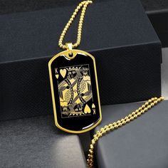 "This King of Hearts Necklace Is the Perfect Gift Whether for Yourself or a Loved One.  Explore all our Inspirational jewelry here: https://www.etsy.com/in-en/shop/SymbolicPresent?ref=seller-platform-mcnav&section_id=31033166 ➜ Our jewelry is made of high-quality surgical steel with a shatterproof liquid glass coating and an 18k gold finish option. ➜ Engrave onto the back of the Playing Card pendant your loved one's name, your wedding date, an anniversary, or anything else you want to remember a Handmade Dog Tag Necklace For Gift, Handmade Dog Tag Jewelry Gift, Gold Necklace For Father's Day Gift, Handmade Dog Tag Jewelry For Gifts, Father's Day Dog Tag Necklace Gift, Father's Day Dog Tag Necklace For Gift, Father's Day Gift Dog Tag Necklace, Gold Heart Shaped Necklace For Father's Day, Gold Necklace For Father's Day Birthday Gift