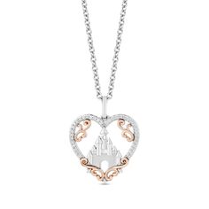 Bring your style dreams to life with this romantic diamond heart pendant from the Enchanted Disney Fine Jewelry Collection. Crafted in sterling silver This open-worked design showcases a turreted castle inside a diamond-lined heart-shaped border. Scrolling ribbons in 10K rose gold add fairytale detail. The 1/10 ct. t.w. diamond pendant suspends along a 17.0-inch cable chain with 2.0-inch extender that secures with a spring-ring clasp. ©Disney Enchanted Disney, Enchanted Disney Fine Jewelry, Disney Fine Jewelry, Cinderella Wedding, Disney Holiday, Disney Jewelry, Heart Pendant Diamond, Disney Stuff, Disney Wedding