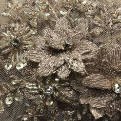 Handmade, high quality Beaded 3D Floral Lace Fabric Embroidered on 100% Polyester Net Mesh. Durable heavy weight fabric. Beautiful on wedding dresses, evening gowns, dance costumes, and more. Content: 100% Polyester / Minimum Order: 1 Yard / Size: Approximately 48" Wide / Ships within 24 business hours. Colors: This product comes in 2 different colors. Elegant Embellished Embroidered Fabric, Elegant Lace Fabric With 3d Embroidery, Elegant Embroidered Lace Fabric For Celebration, Elegant Floral Embellished Lace Fabric, Elegant Embroidered Fabric With Floral Applique For Party, Elegant Formal Embroidered Fabric With Intricate Embroidery, Elegant Embellished Embroidered Fabric For Festive Season, Elegant Floral Embroidered Fabric For Party, Elegant Embellished Embroidered Fabric For Celebration