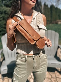 MANDRN 100% genuine leather Handmade with soft leather that just looks better with age! Wear it 4 ways as a belt, crossbody, fanny pack and clutch Removable leather wristlet so you can wear your Ziggy like a clutch Belt strap that doubles as an everyday belt to wear Large enough to carry an iPhone 13+ Pro, cardholder wallet, make-up, and other essentials Adjustable belt closure strap that allows for wearing around the hip, across the body, over the shoulder Bag dimensions: 7.5" x 4" x 2" Belt di Belt Bag Leather Women, Leather Clutch Belt Bag For On-the-go, Everyday Leather Clutch Belt Bag, Leather Clutch Belt Bag For Everyday, Everyday Leather Belt Bag With Leather Strap, Soft Leather Belt Bag For On-the-go, Leather Belt Bag With Removable Belt For On-the-go, Jewlery Earrings, Crossbody Fanny Pack