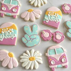 decorated cookies are displayed on a table